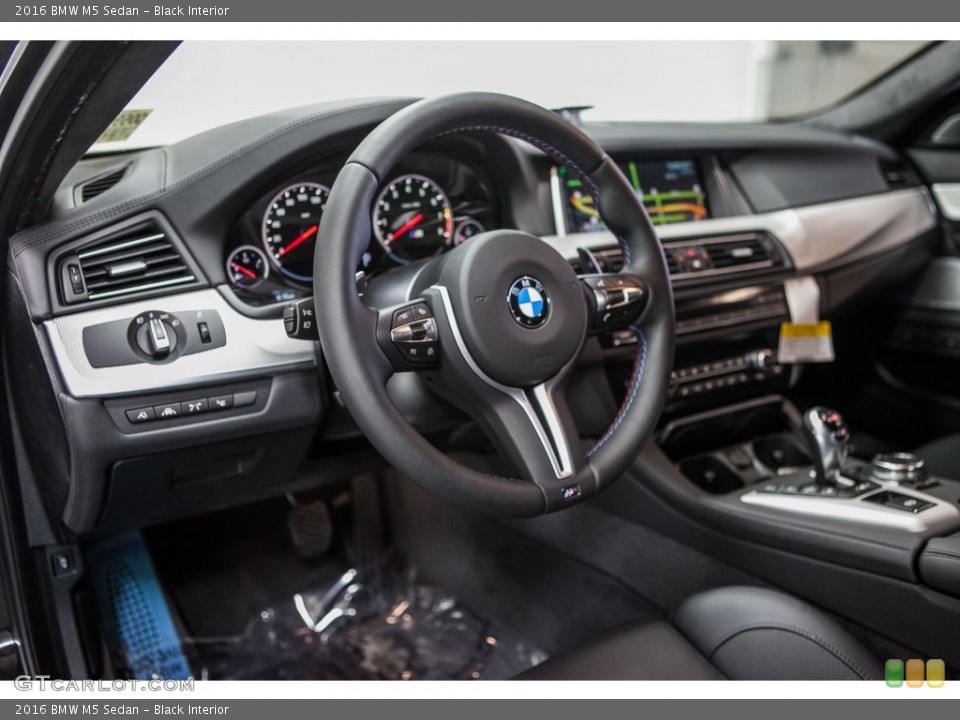 Black Interior Steering Wheel for the 2016 BMW M5 Sedan #110231747