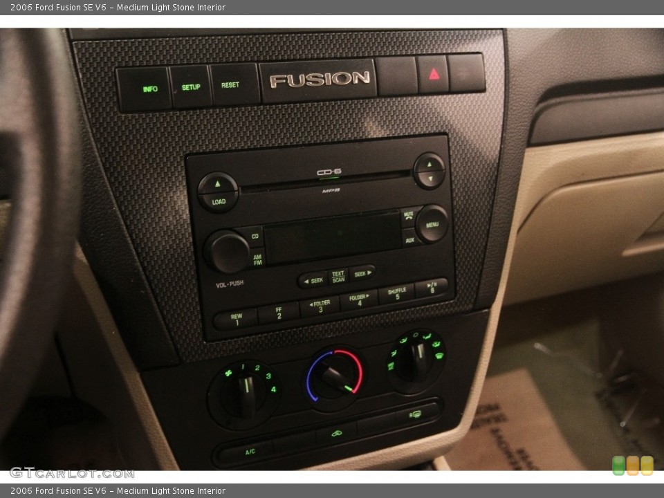Medium Light Stone Interior Controls for the 2006 Ford Fusion SE V6 #110828979
