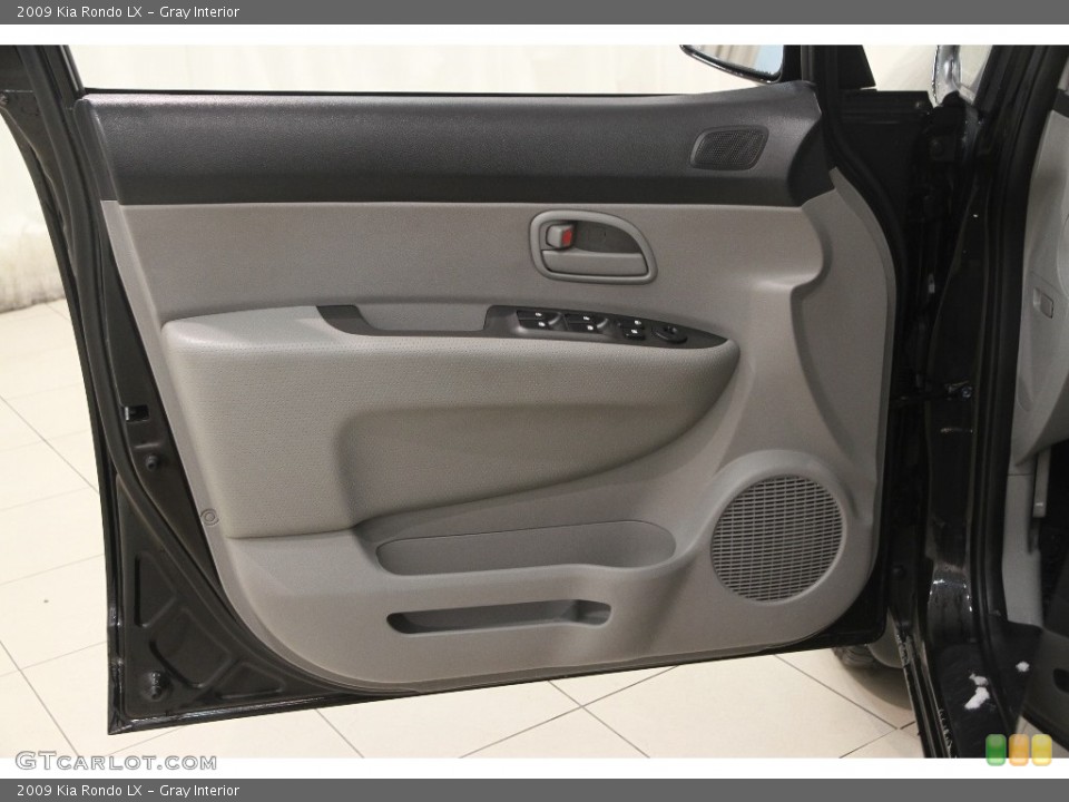 Gray Interior Door Panel for the 2009 Kia Rondo LX #110830270