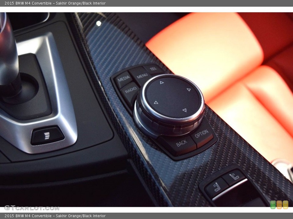 Sakhir Orange/Black Interior Controls for the 2015 BMW M4 Convertible #110979788