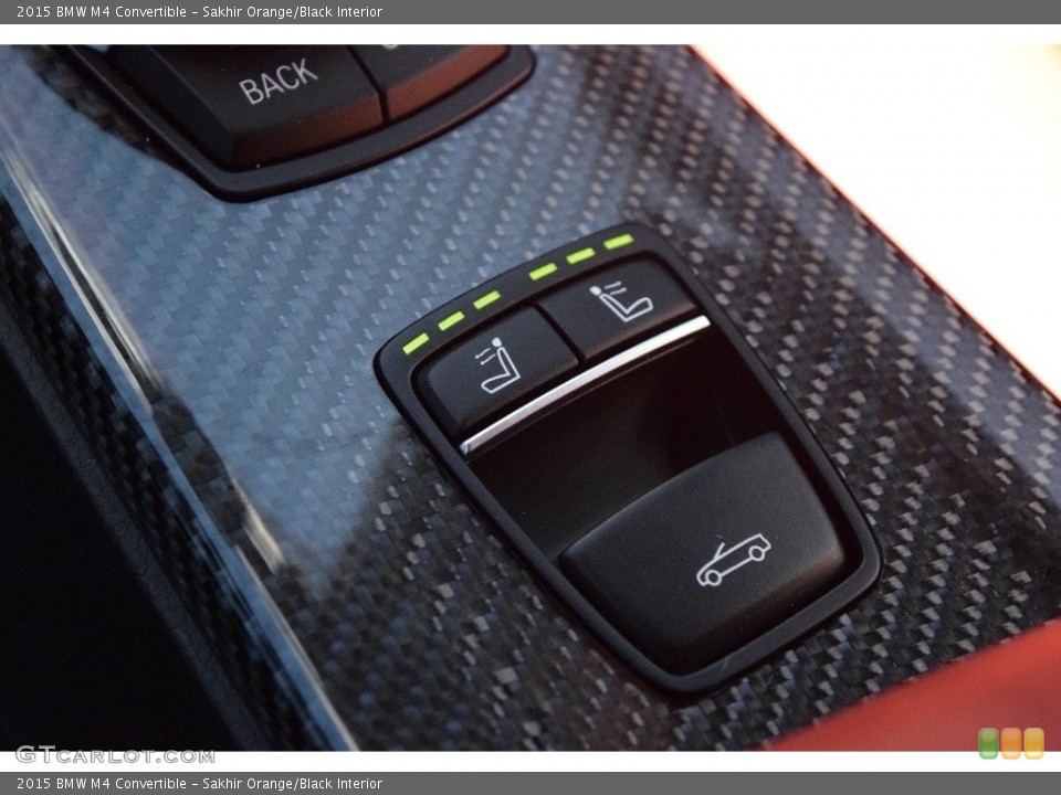 Sakhir Orange/Black Interior Controls for the 2015 BMW M4 Convertible #110980022