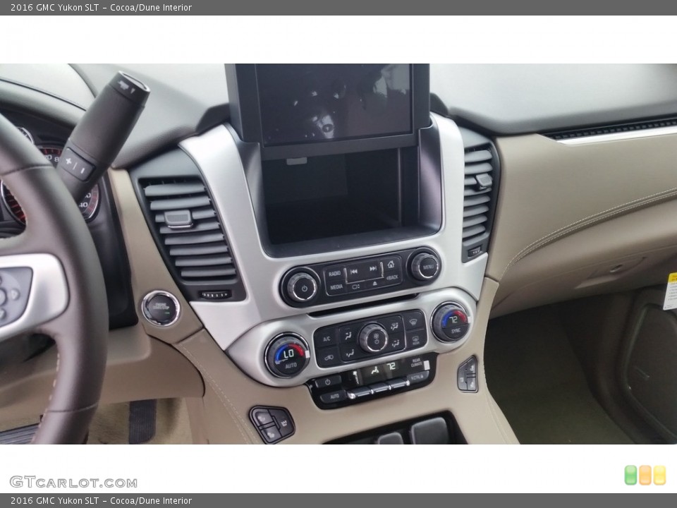 Cocoa/Dune Interior Controls for the 2016 GMC Yukon SLT #111106580