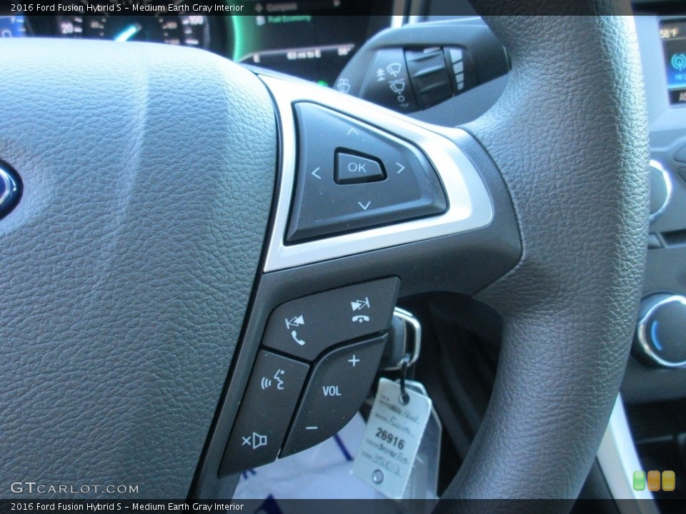 Medium Earth Gray Interior Controls for the 2016 Ford Fusion Hybrid S #111143342