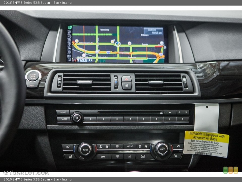 Black Interior Controls for the 2016 BMW 5 Series 528i Sedan #111179653