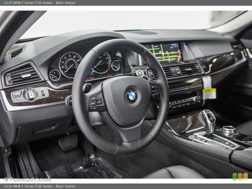 Black Interior Dashboard for the 2016 BMW 5 Series 528i Sedan #111179701