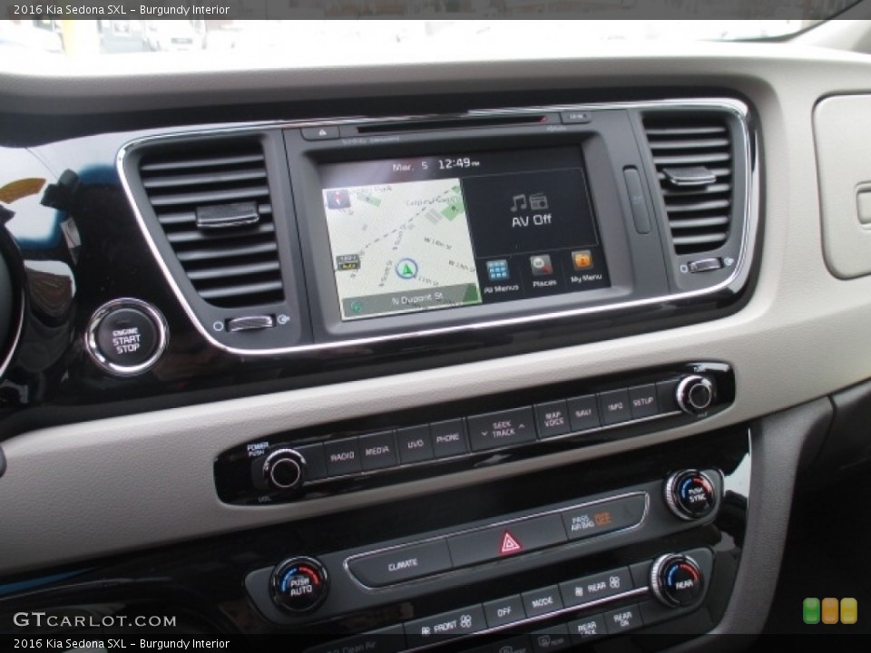 Burgundy Interior Controls for the 2016 Kia Sedona SXL #111331026