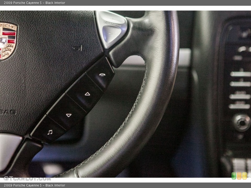 Black Interior Steering Wheel for the 2009 Porsche Cayenne S #111673292