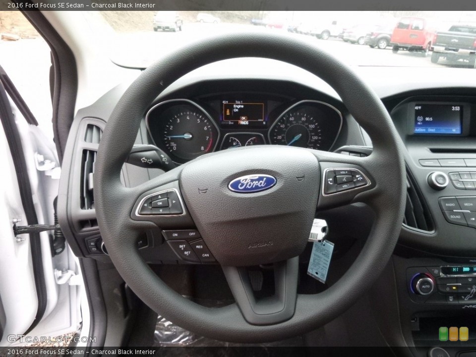 Charcoal Black Interior Steering Wheel for the 2016 Ford Focus SE Sedan #111829175