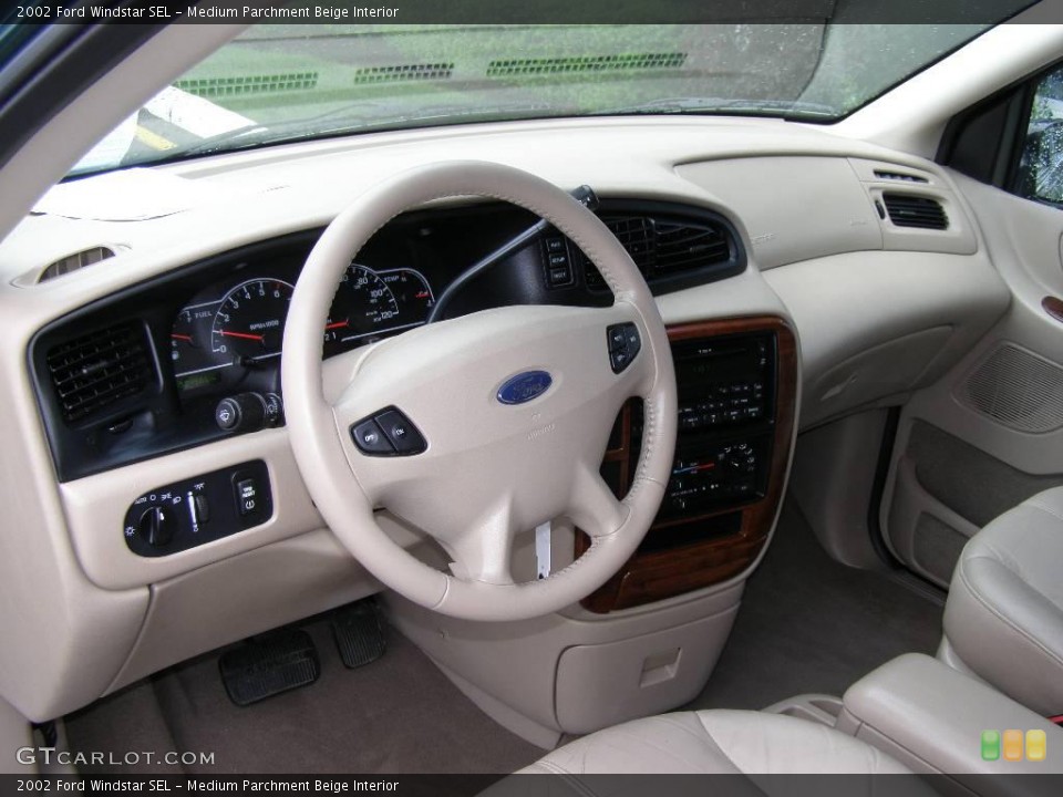 Medium Parchment Beige Interior Dashboard for the 2002 Ford Windstar SEL #11191945
