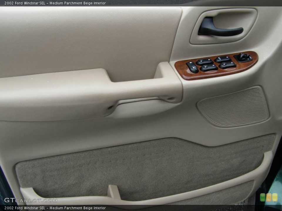 Medium Parchment Beige Interior Door Panel for the 2002 Ford Windstar SEL #11191950