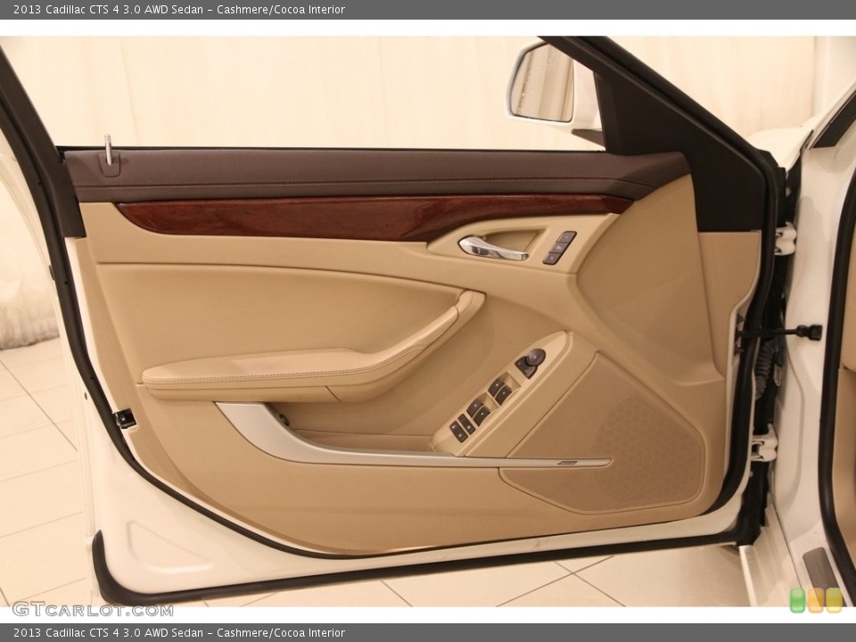 Cashmere/Cocoa Interior Door Panel for the 2013 Cadillac CTS 4 3.0 AWD Sedan #112223084