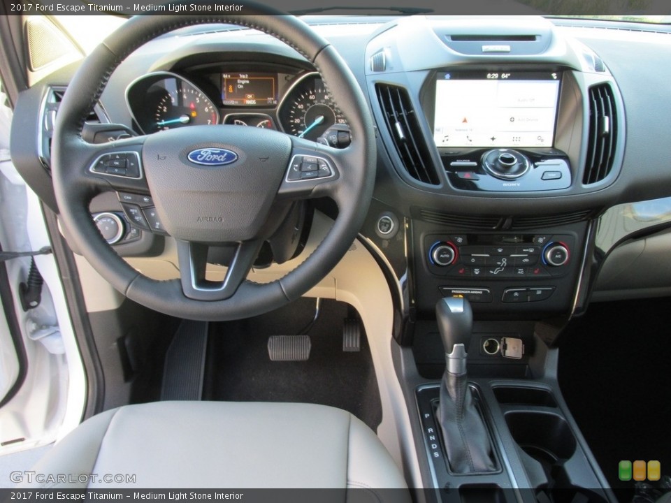 Medium Light Stone Interior Dashboard for the 2017 Ford Escape Titanium #112756718