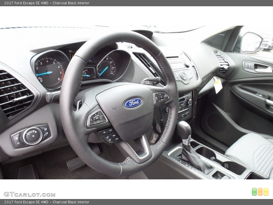 Charcoal Black Interior Dashboard for the 2017 Ford Escape SE 4WD #112876522