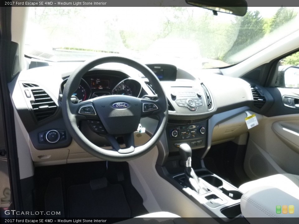 Medium Light Stone Interior Prime Interior for the 2017 Ford Escape SE 4WD #113013427