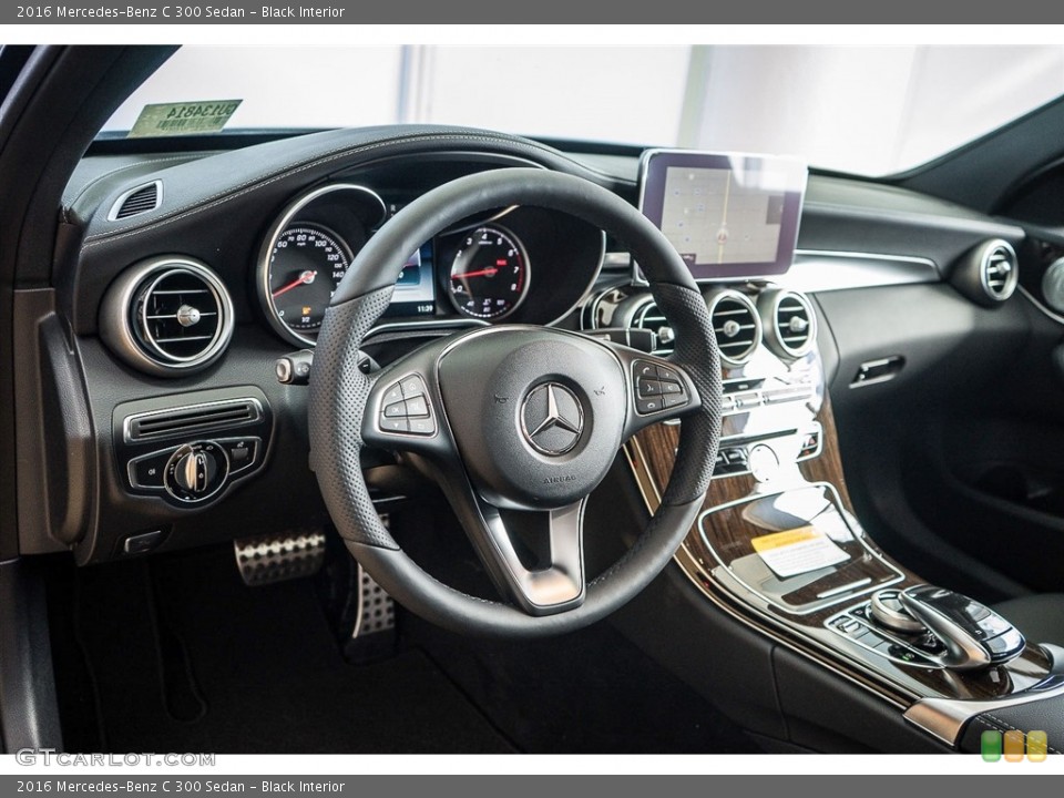 Black Interior Dashboard for the 2016 Mercedes-Benz C 300 Sedan #113079314