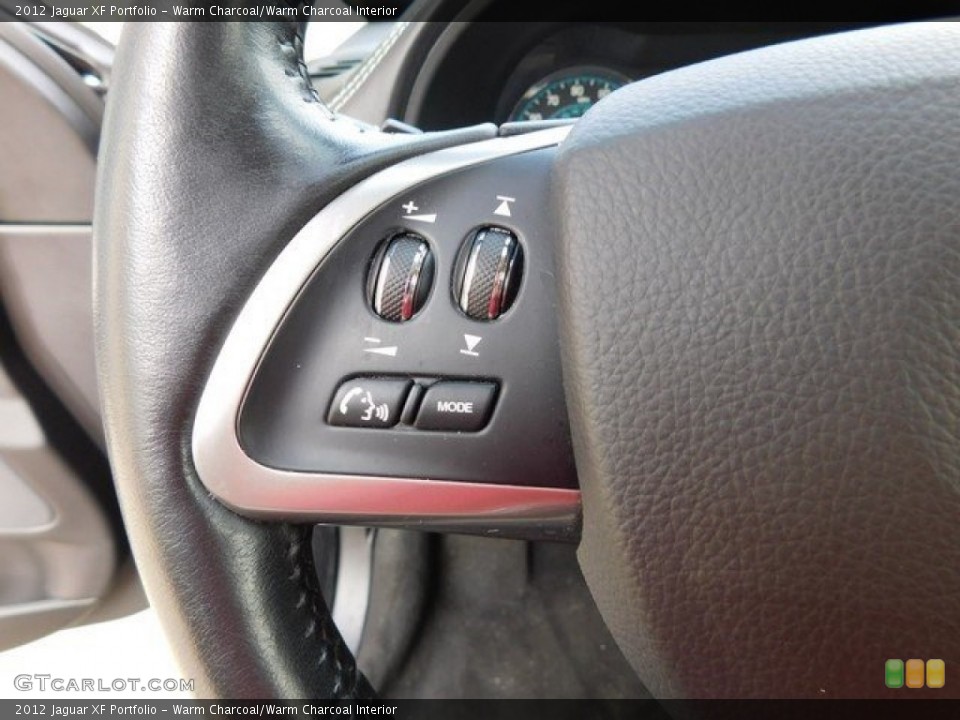 Warm Charcoal/Warm Charcoal Interior Controls for the 2012 Jaguar XF Portfolio #113195617
