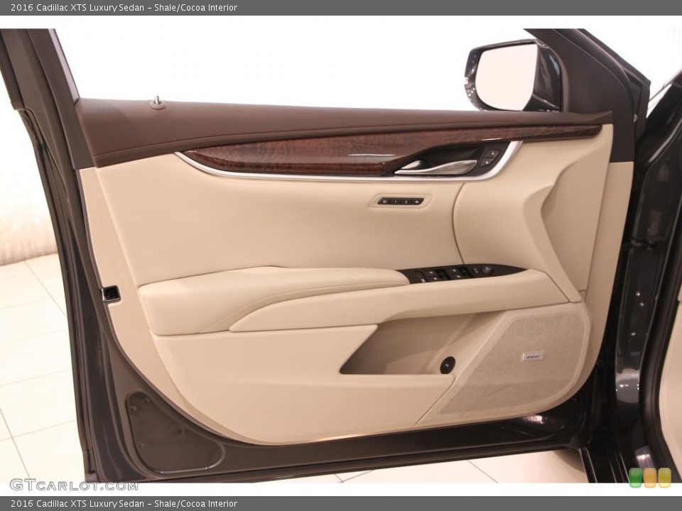 Shale/Cocoa Interior Door Panel for the 2016 Cadillac XTS Luxury Sedan #113255829