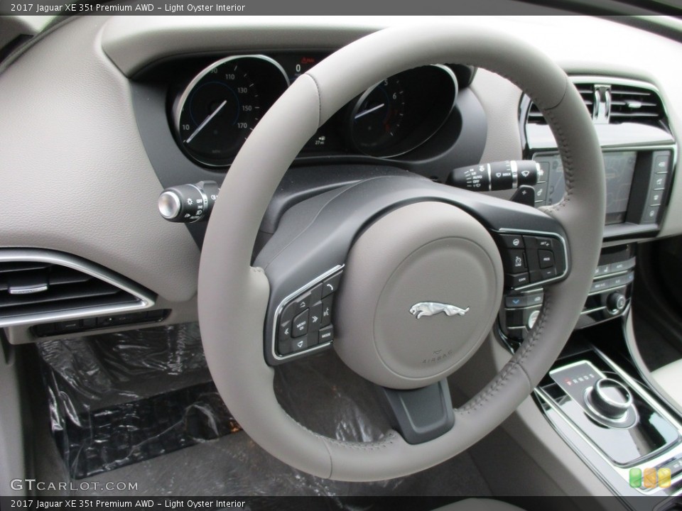 Light Oyster Interior Steering Wheel for the 2017 Jaguar XE 35t Premium AWD #113718211