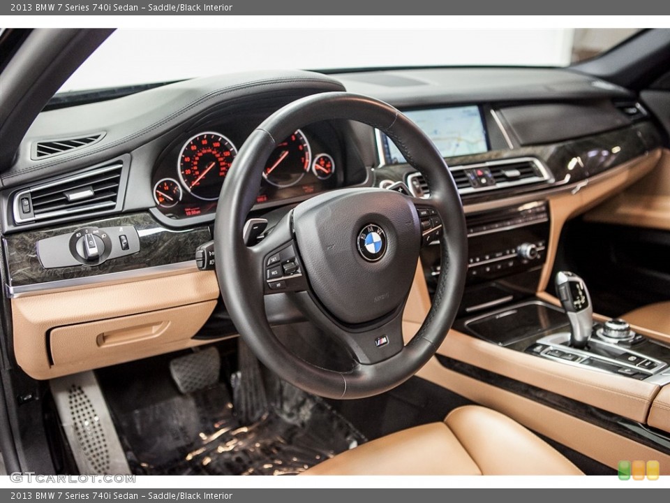 Saddle/Black Interior Dashboard for the 2013 BMW 7 Series 740i Sedan #114199497