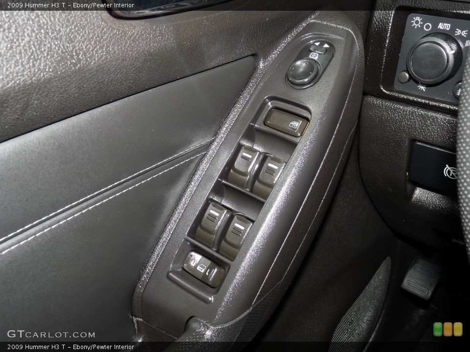 Ebony/Pewter Interior Controls for the 2009 Hummer H3 T #114875801