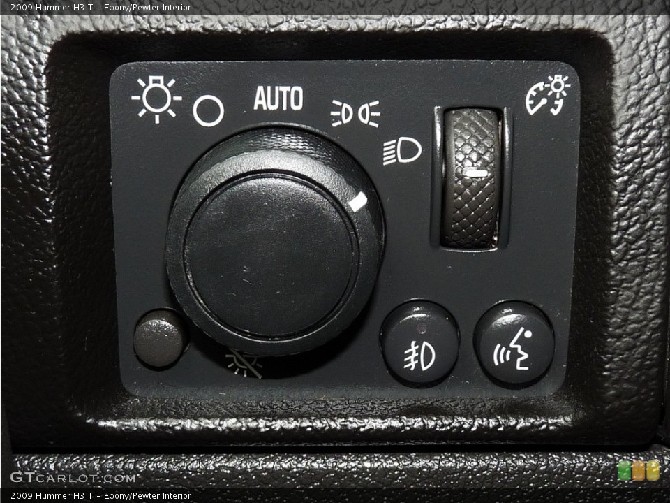 Ebony/Pewter Interior Controls for the 2009 Hummer H3 T #114875837