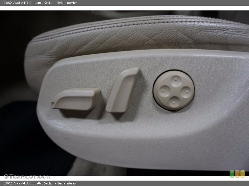 Beige Interior Controls for the 2002 Audi A4 3.0 quattro Sedan #115109847