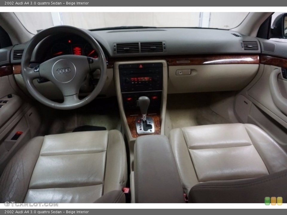 Beige Interior Dashboard for the 2002 Audi A4 3.0 quattro Sedan #115109877