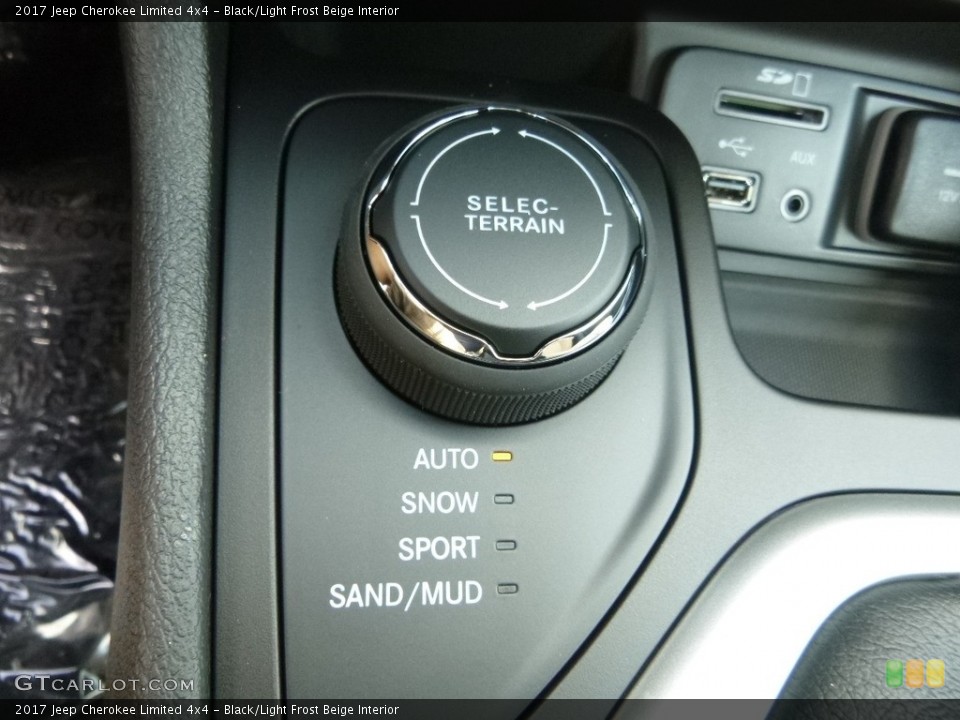 Black/Light Frost Beige Interior Controls for the 2017 Jeep Cherokee Limited 4x4 #115281514