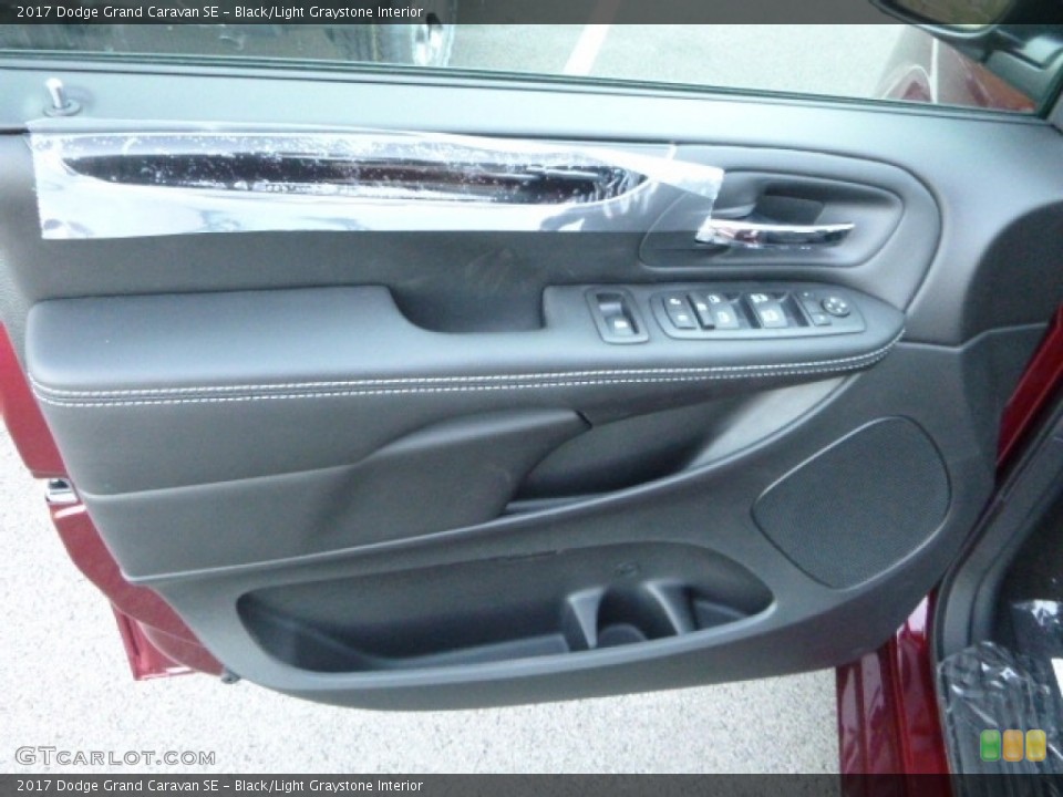 Black/Light Graystone Interior Door Panel for the 2017 Dodge Grand Caravan SE #115383027