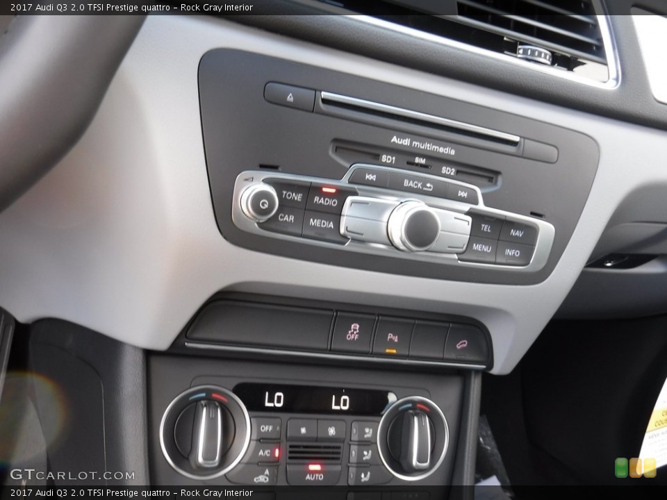 Rock Gray Interior Controls for the 2017 Audi Q3 2.0 TFSI Prestige quattro #115460937