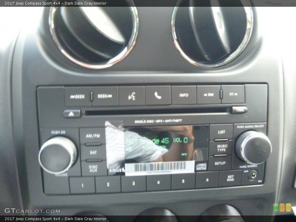 Dark Slate Gray Interior Controls for the 2017 Jeep Compass Sport 4x4 #115504876