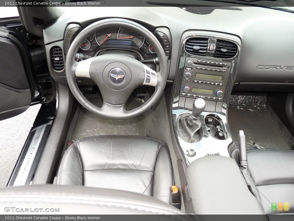 Ebony Black Interior Dashboard for the 2011 Chevrolet Corvette Coupe #115586009