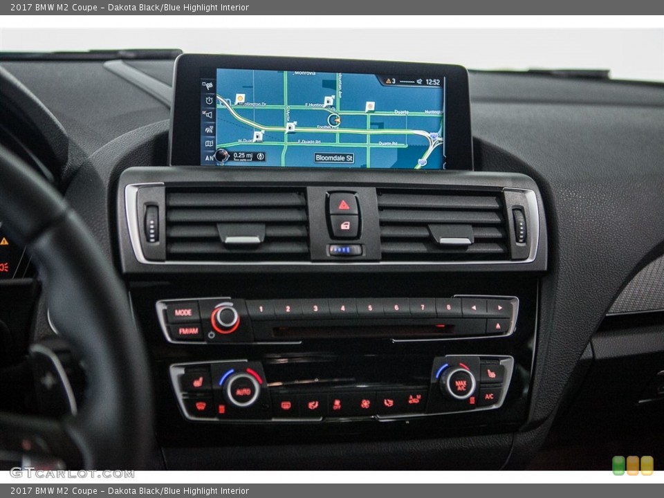 Dakota Black/Blue Highlight Interior Controls for the 2017 BMW M2 Coupe #115719063