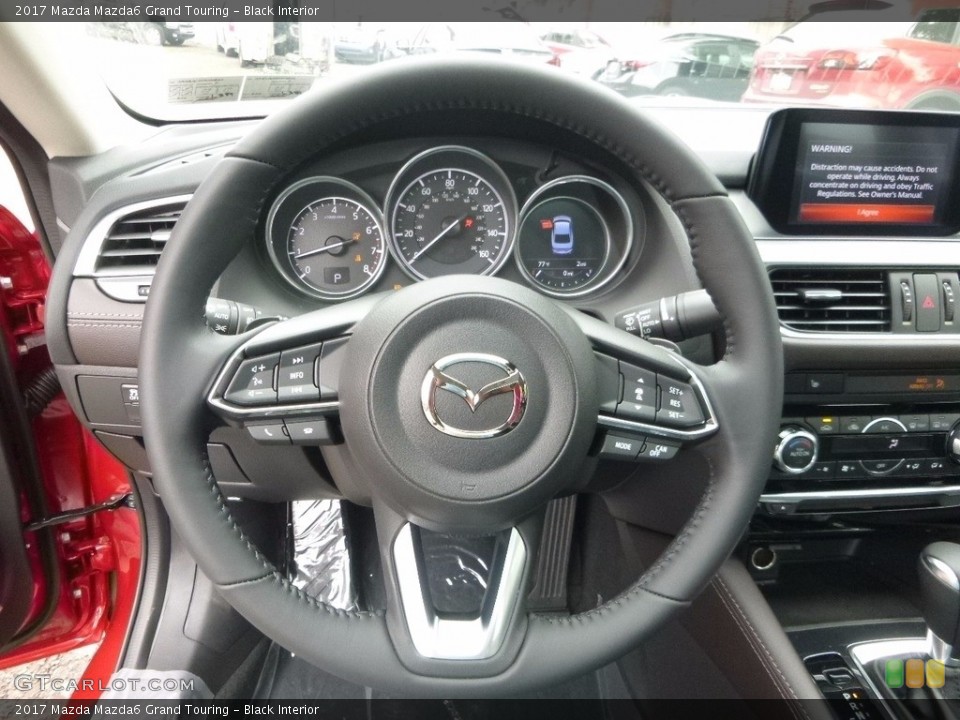 Black Interior Steering Wheel for the 2017 Mazda Mazda6 Grand Touring #115829331