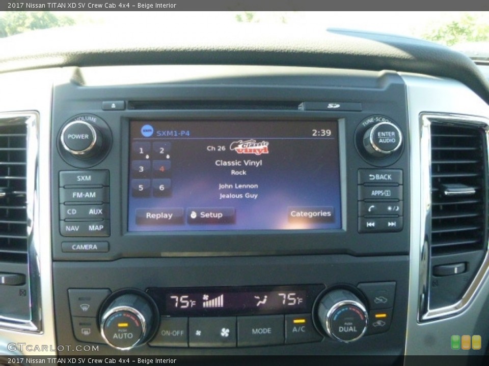 Beige Interior Controls for the 2017 Nissan TITAN XD SV Crew Cab 4x4 #115850548
