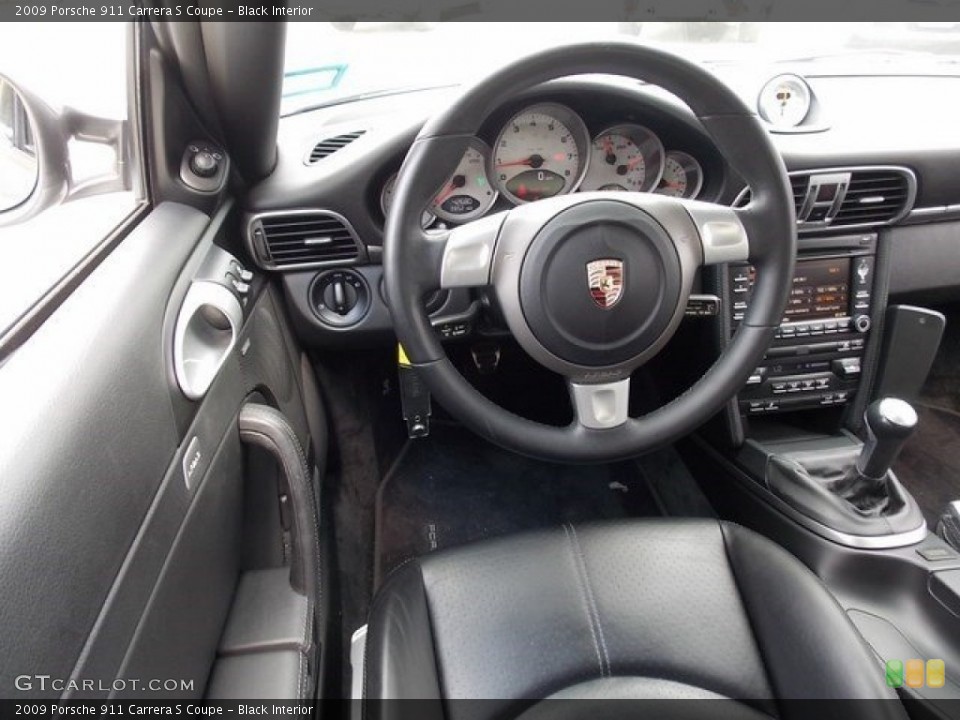 Black Interior Dashboard for the 2009 Porsche 911 Carrera S Coupe #115894008