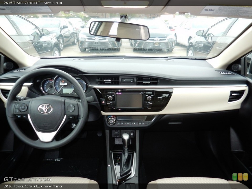 Ivory Interior Dashboard for the 2016 Toyota Corolla LE #116081597