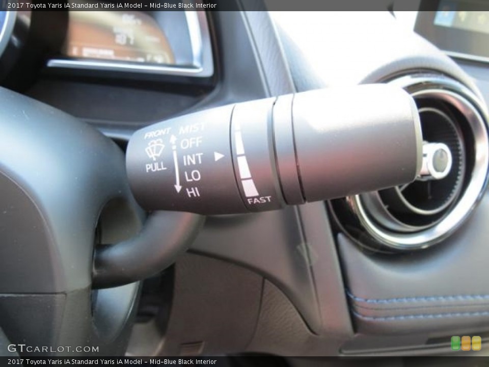 Mid-Blue Black Interior Controls for the 2017 Toyota Yaris iA  #116145839