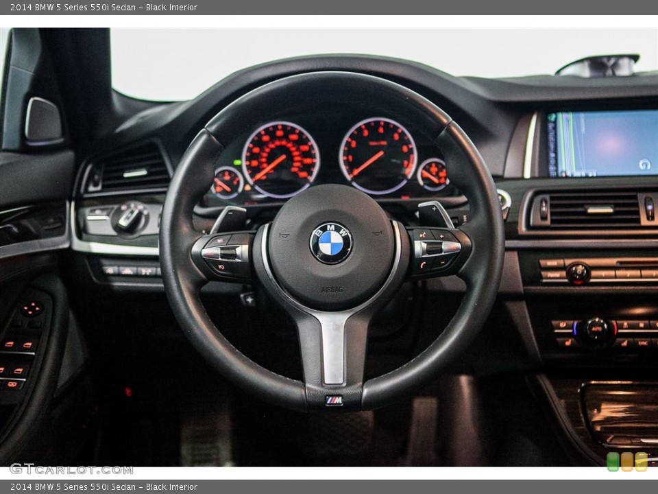 Black Interior Steering Wheel for the 2014 BMW 5 Series 550i Sedan #116159721
