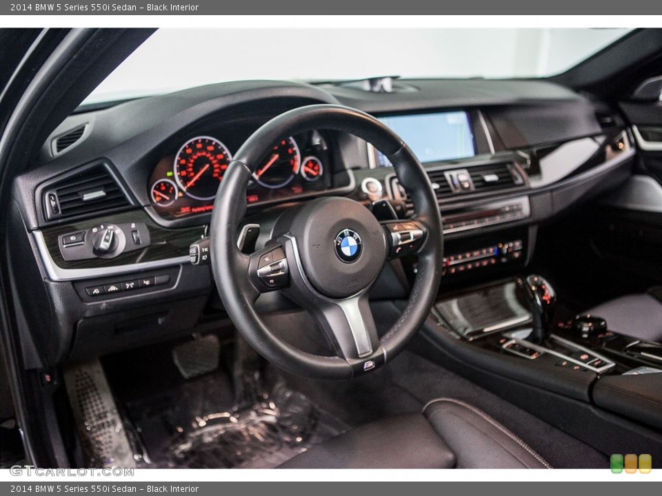Black Interior Dashboard for the 2014 BMW 5 Series 550i Sedan #116159789