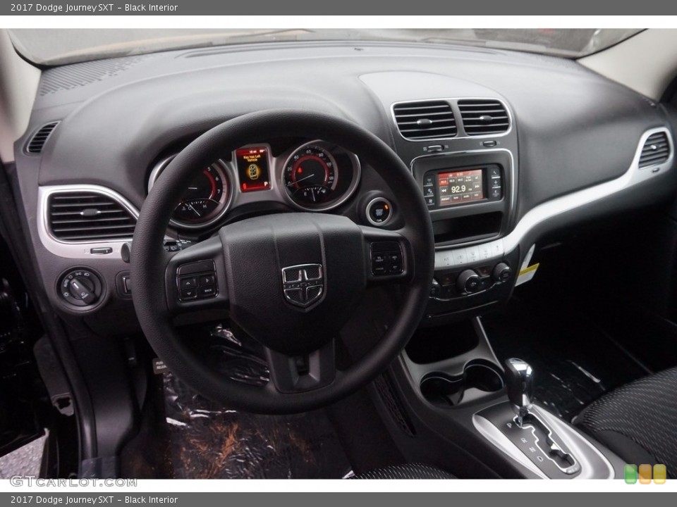 Black Interior Dashboard for the 2017 Dodge Journey SXT #116234963