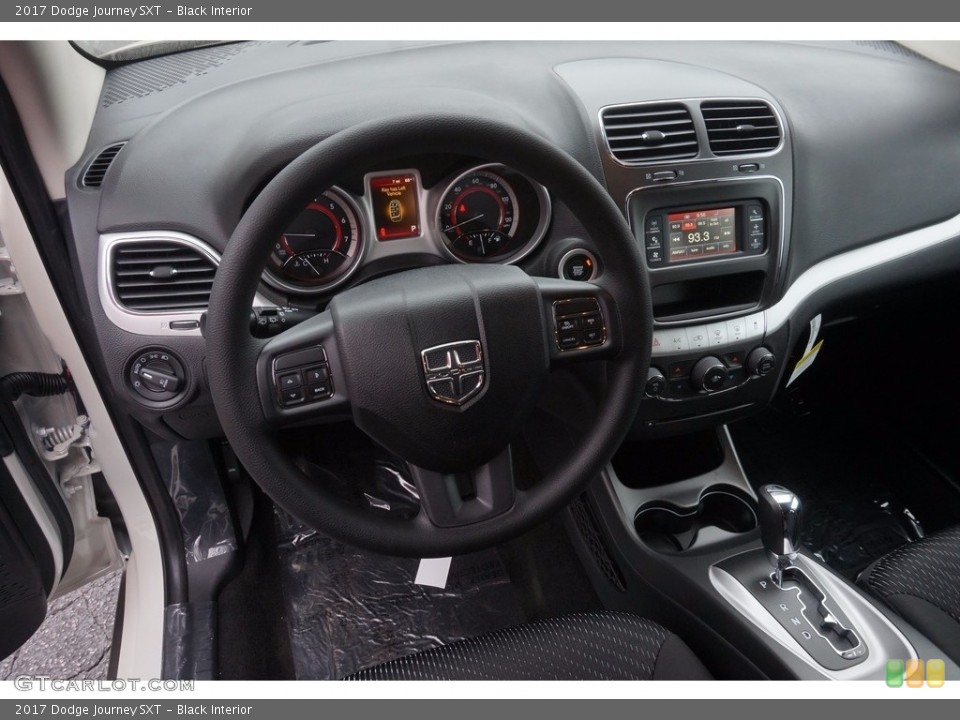 Black Interior Dashboard for the 2017 Dodge Journey SXT #116235635