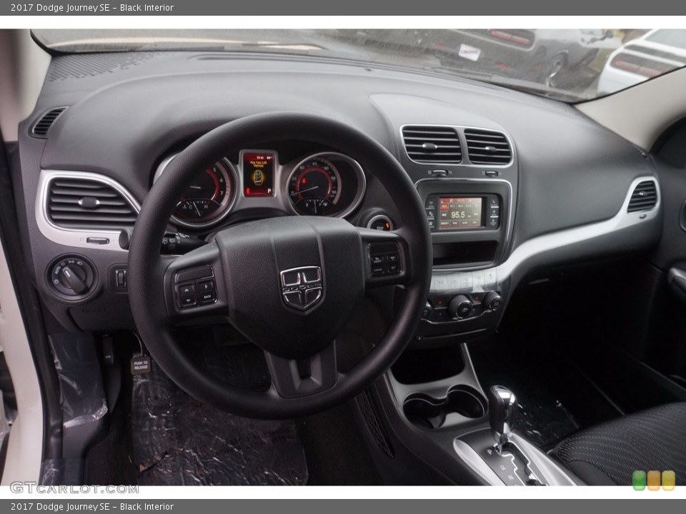Black Interior Dashboard for the 2017 Dodge Journey SE #116236316