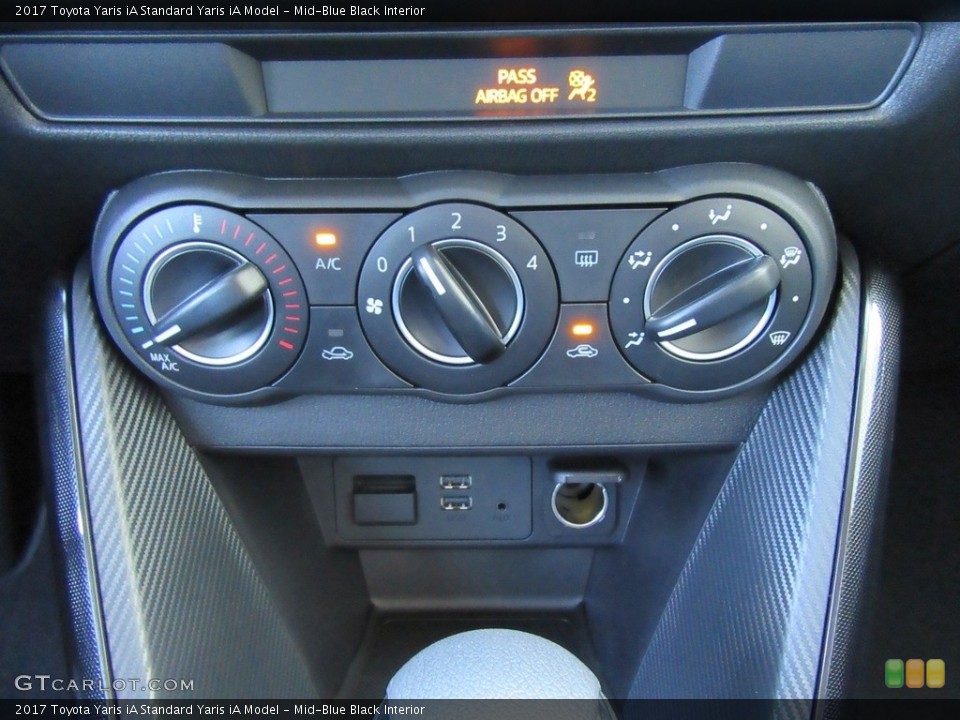 Mid-Blue Black Interior Controls for the 2017 Toyota Yaris iA  #116304956
