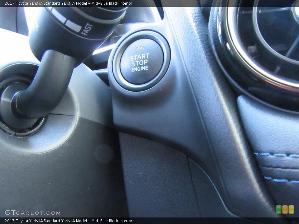 Mid-Blue Black Interior Controls for the 2017 Toyota Yaris iA  #116305035