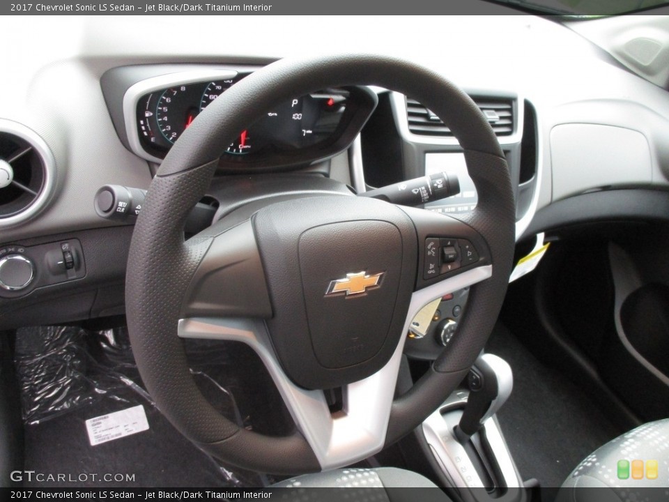 Jet Black/Dark Titanium Interior Steering Wheel for the 2017 Chevrolet Sonic LS Sedan #116307252