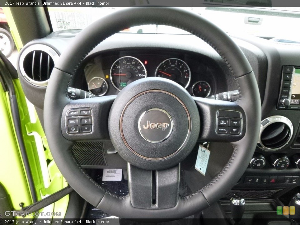 Black Interior Steering Wheel for the 2017 Jeep Wrangler Unlimited Sahara 4x4 #116383406