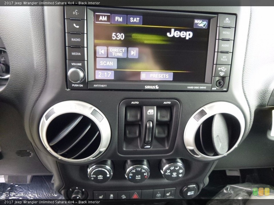 Black Interior Controls for the 2017 Jeep Wrangler Unlimited Sahara 4x4 #116383481