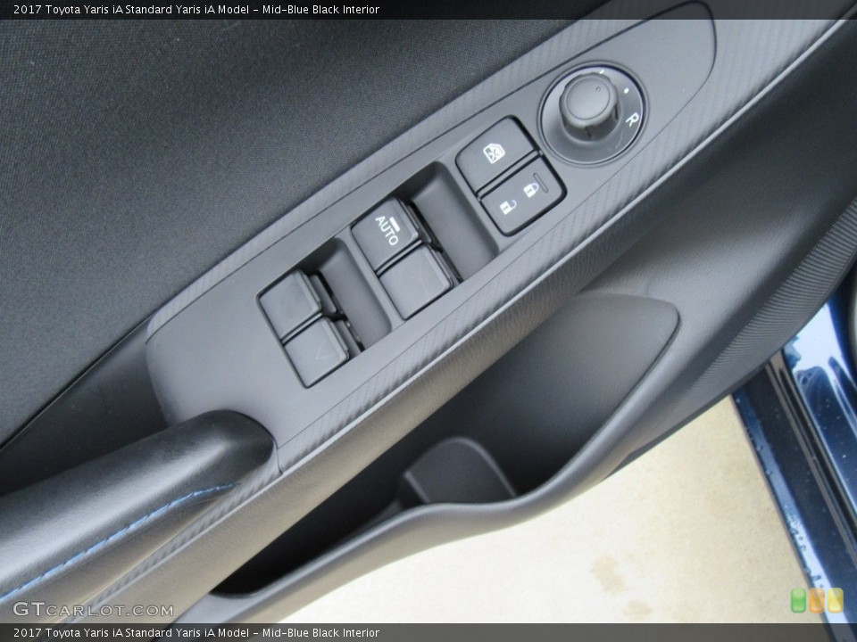 Mid-Blue Black Interior Controls for the 2017 Toyota Yaris iA  #116490786