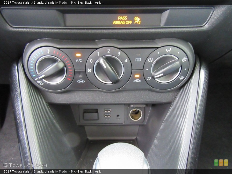 Mid-Blue Black Interior Controls for the 2017 Toyota Yaris iA  #116490936